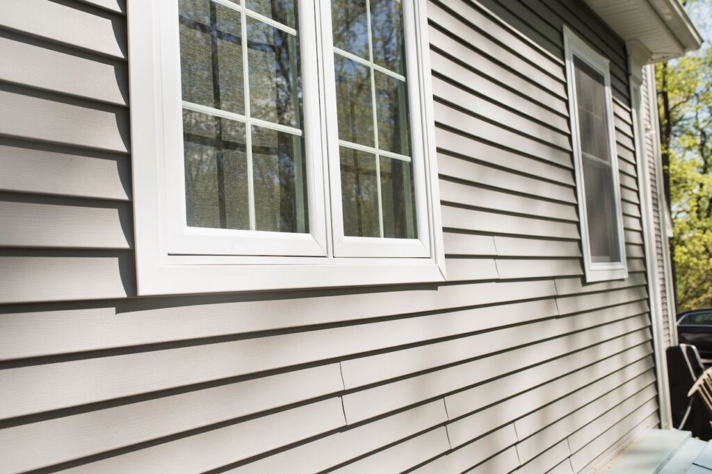 vinyl siding on house with window frames